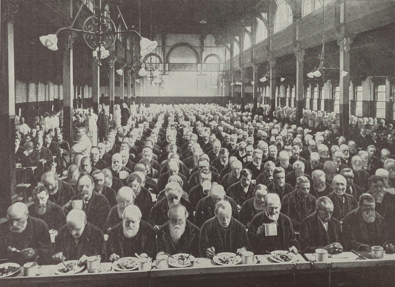 Men at dinner in St Marylebone Workhouse London c1900.credit Geffrye Museum of the Home.jpg