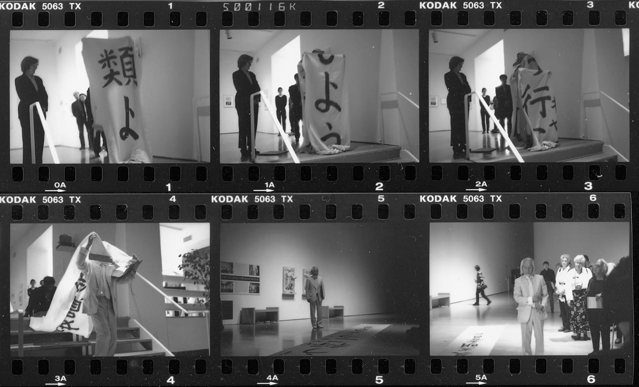 Jane Farver serving as a witness to Matsuzawa Yutaka’s performance of "Vanishing of Humankind" at 'Global Conceptualism' in 1999 