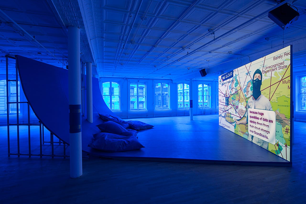 Installation view, 'Hito Steyerl' at Artists Space, 2015, with view of "Liquidity, Inc." (2014), HD video with sound, 30 mins (courtesy the artist and Andrew Kreps, New York; image courtesy Artists Space)