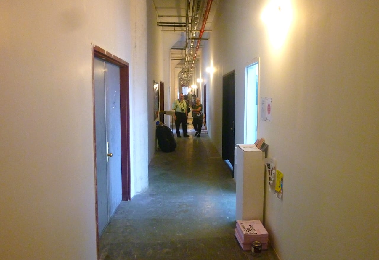 The hallway at 1717 Troutman Street, a major studio building in Ridgewood, during Bushwick Open Studios 2010 (photo by the author for Hyperallergic)