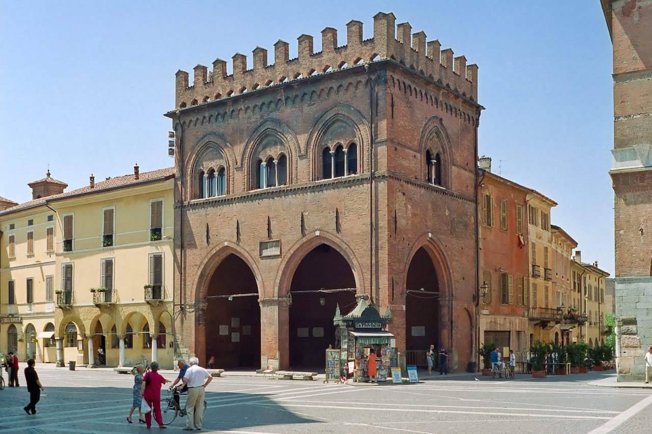 La Loggia dei Militi in Cremona, Italy; the "Statue of the Two Hercules" sits in its portico. (photo by David Nicholls/Wikimedia Commons)