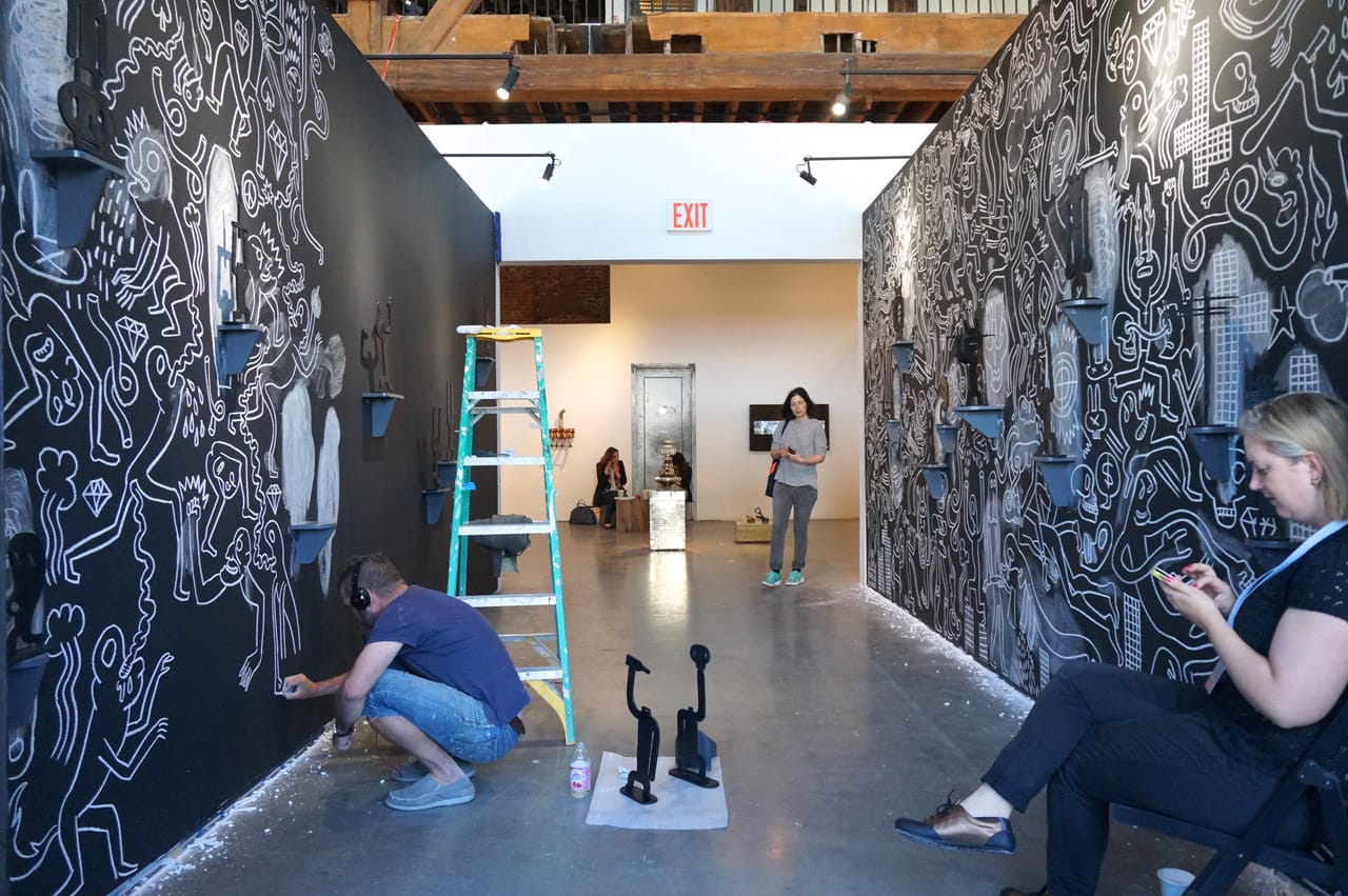 Conrad Botes drawing his installation at Bennett Contemporary