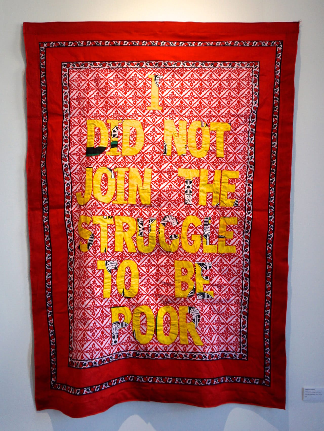 Lawrence Lemaoana, "I didn't join the struggle to be poor" (2015), fabric and embroidery, 155 x 110 cm, at Afronova's booth