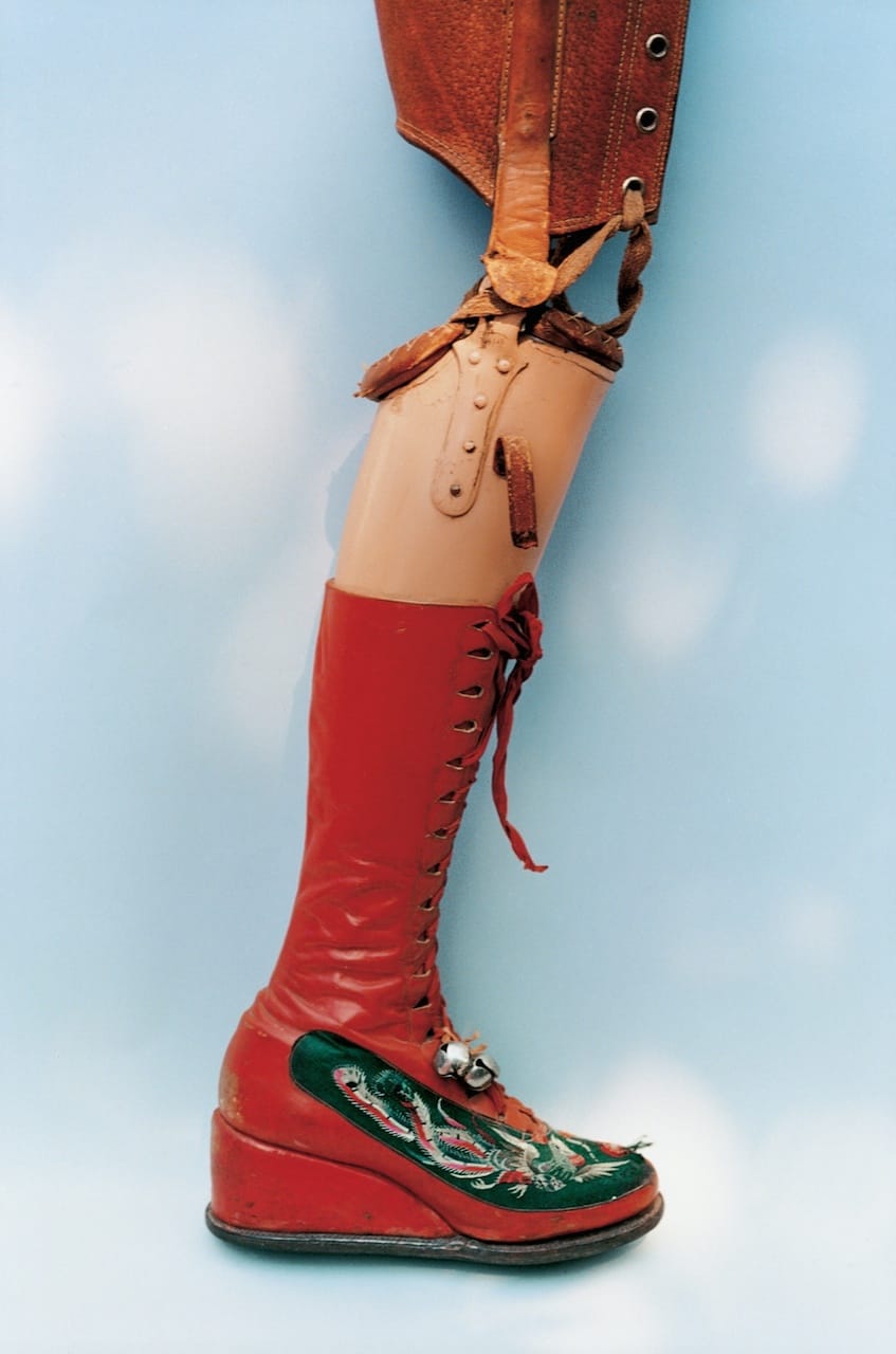 After Frida Kahlo's leg was amputated in 1953 she designed this prosthetic with bells on the red boot. Frida by Ishiuchi #36, 2012-2015 © Ishiuchi Miyako. Courtesy Michael Hoppen Gallery press image