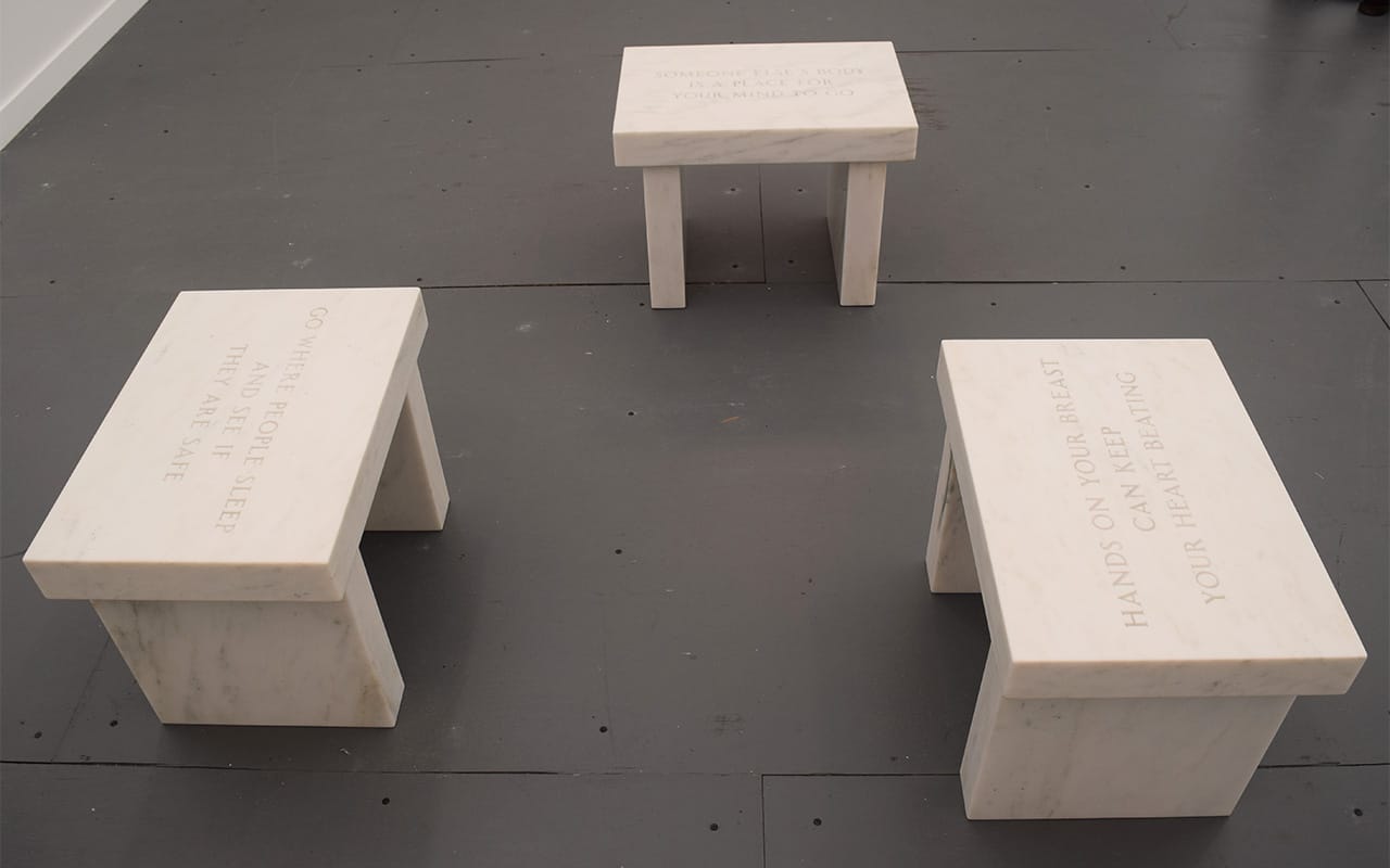 Jenny Holzer, "Selection from Survival: Hands on your breast... Text: Survival (1983–85)" (2006), "Selection from Survival: Someone else's body... Text: Survival (1983–85)" (2006), and "Selection from Survival: Go where people... Text: Survival (1983–85)" (2006) in the Sprüth Magers booth at Frieze New York