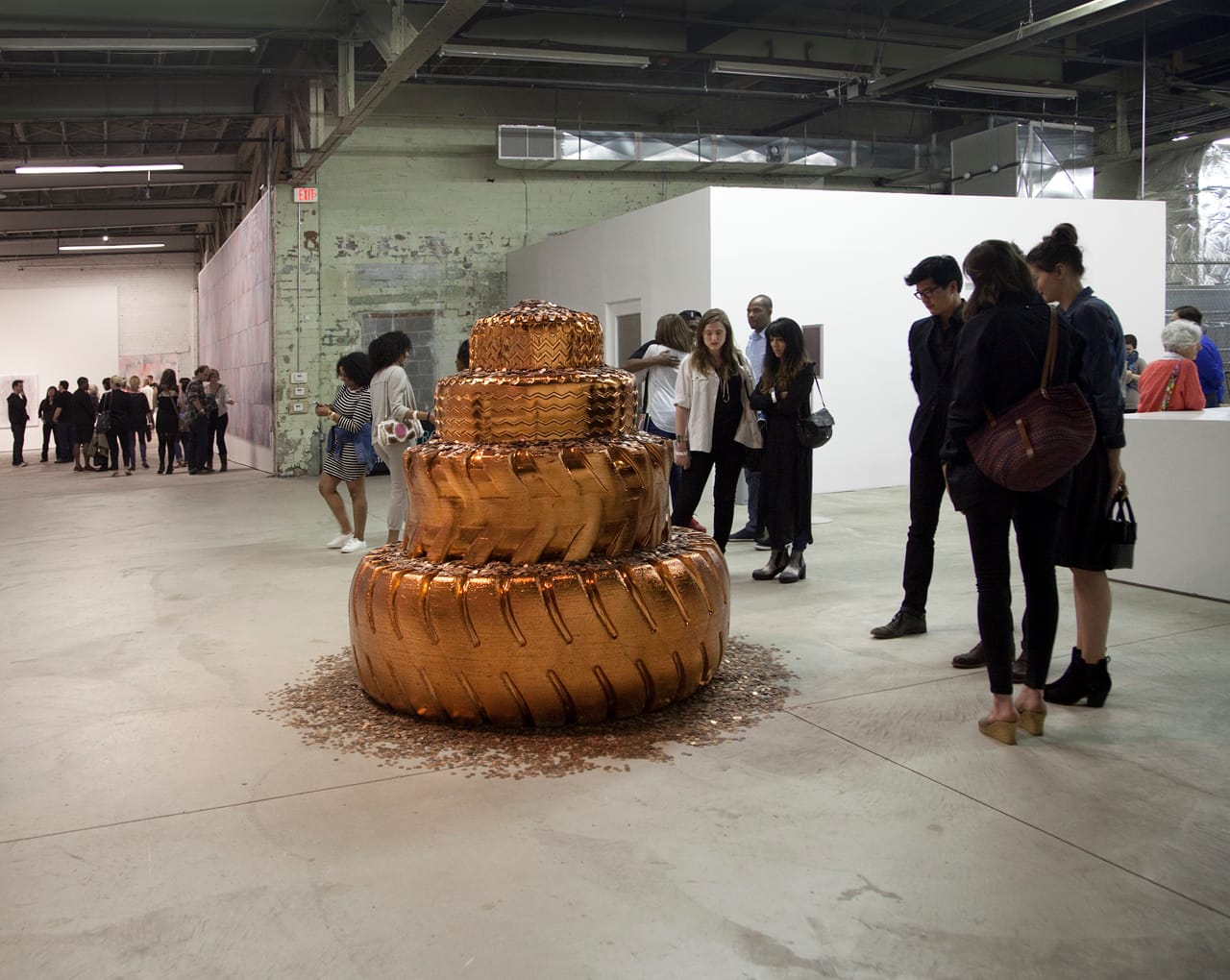 Visitors looking at "The Lincoln Monument" during the opening reception