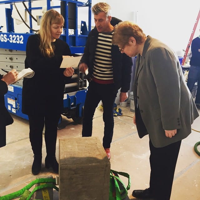 Curators Chrissie Iles and Donna De Salvo with Maurizio Cattelan during the reburial of his work at the new Whitney (courtesy Whitney Museum, via Instagram)