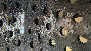 A GIF detail of one wall shows the effect of the explosive video against the mirrors.