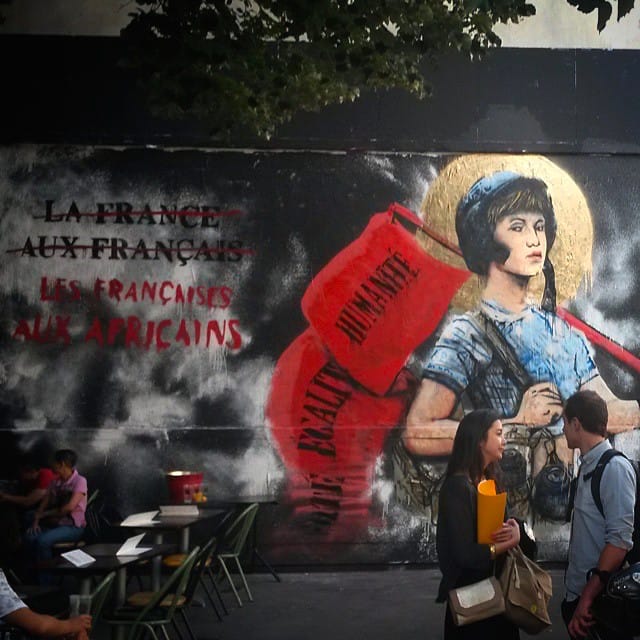 Combo's mural in Paris's 11th arrondissement, before it was vandalized. (photo by Combo, via Instagram)
