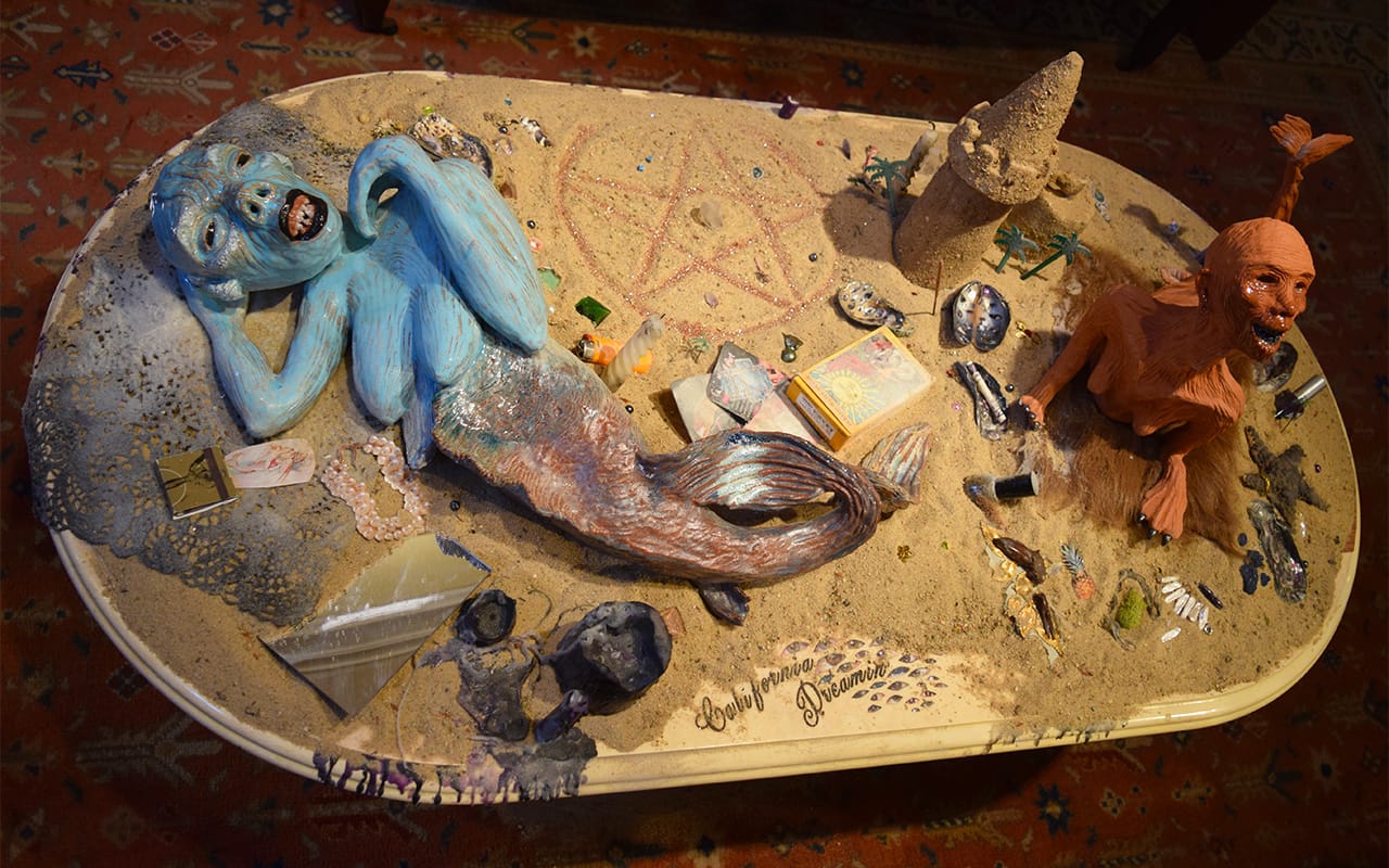 Coffee table installation by Roxanne Jackson with the sculptures "Early Woman" (2015, right) and "California Dreamin'" (2015, left)