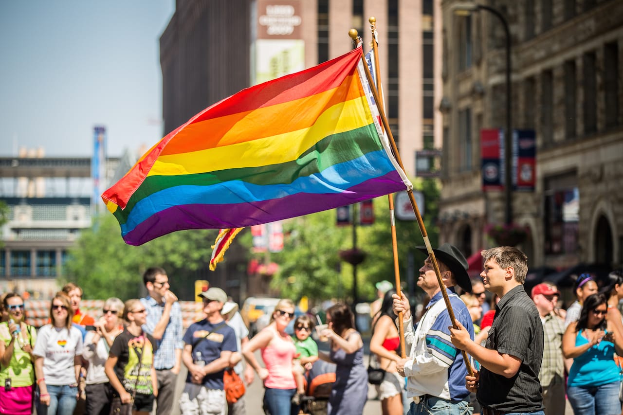 A Rainbow Flag at the 2013 Twin Cities Pride Parade in Minneapolis (photo by Tony Webster, via Wikimedia Commons)