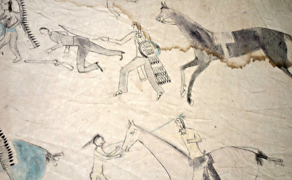 Jṑqī́gácút: Tipi With Battle Pictures