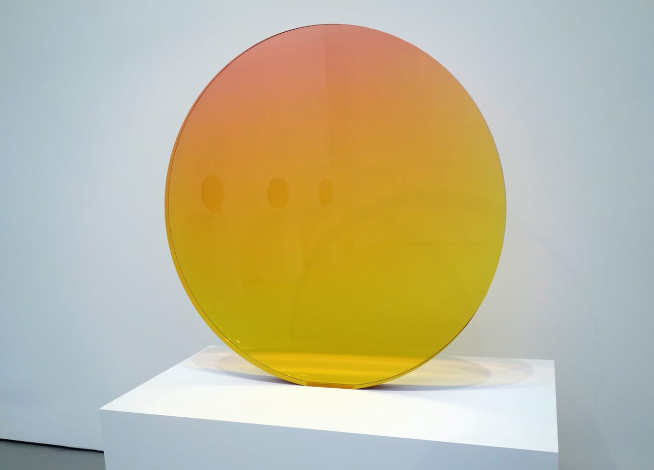 De Wain Valentine, "Circle Amber-Rose" (1970), cast polyester resin, 33 5/8 x 33 3/4 x 2 inches