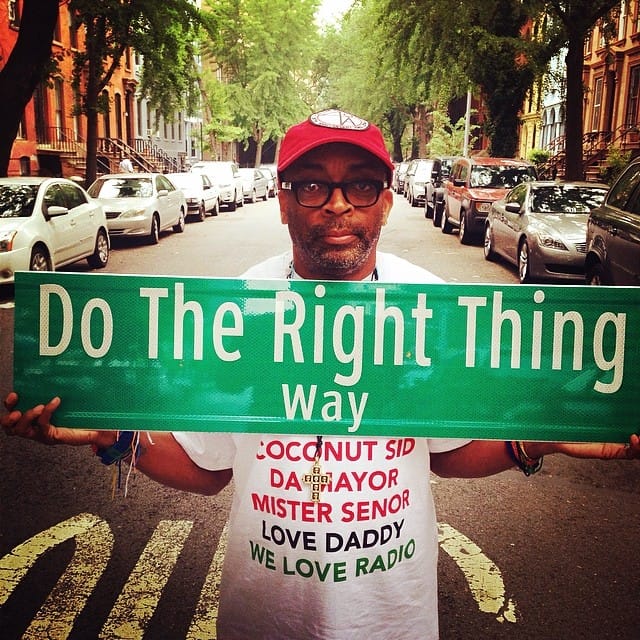 Spike Lee with a mockup of the "Do the Right Thing Way" street sign (photo by @sheltonjlee/Twitter)