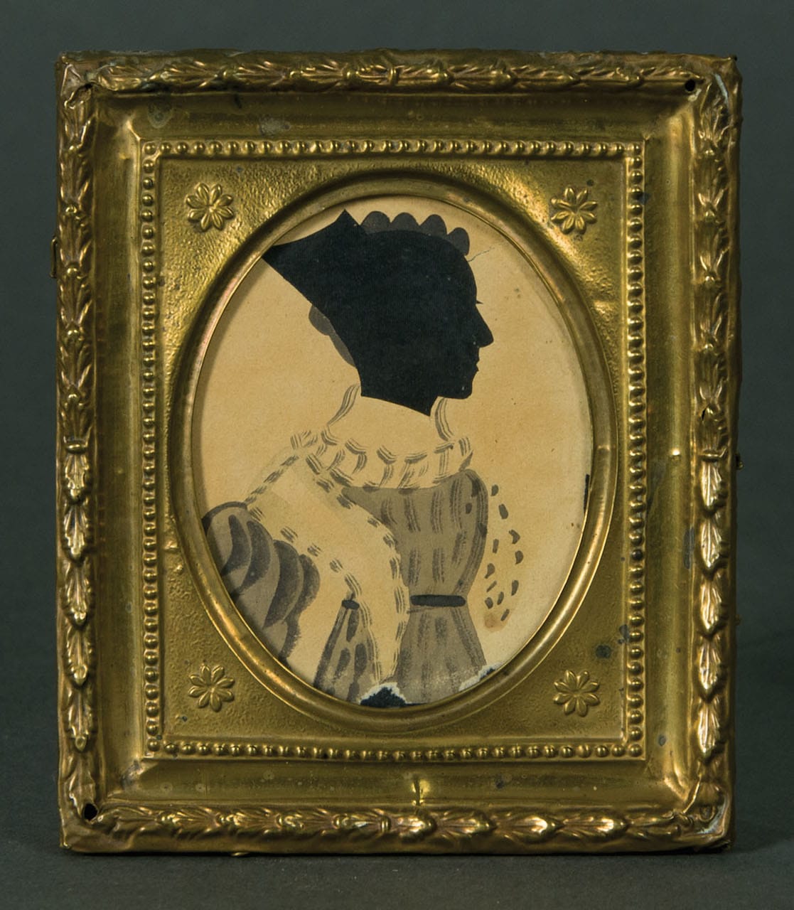 Part of a pair of 19th-century hollow-cut silhouettes showing a woman and gentleman on black silk, with watercolor bodies, in gilt repousse frames, both attributed to the so-called "Dash Artist" (Fertig Collection, all images courtesy Willis Henry Auctions)