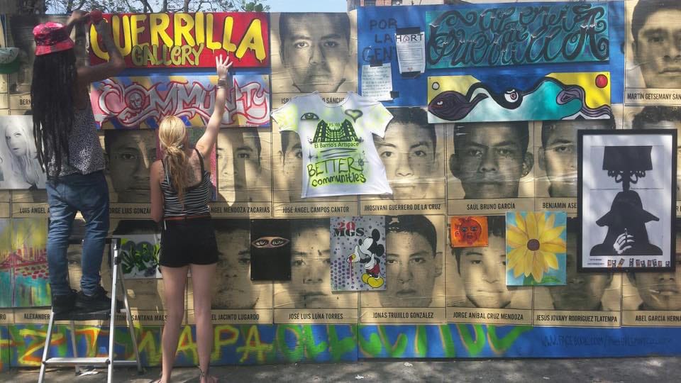 The Guerrilla Gallery with Zappa's work and new pieces posted over it