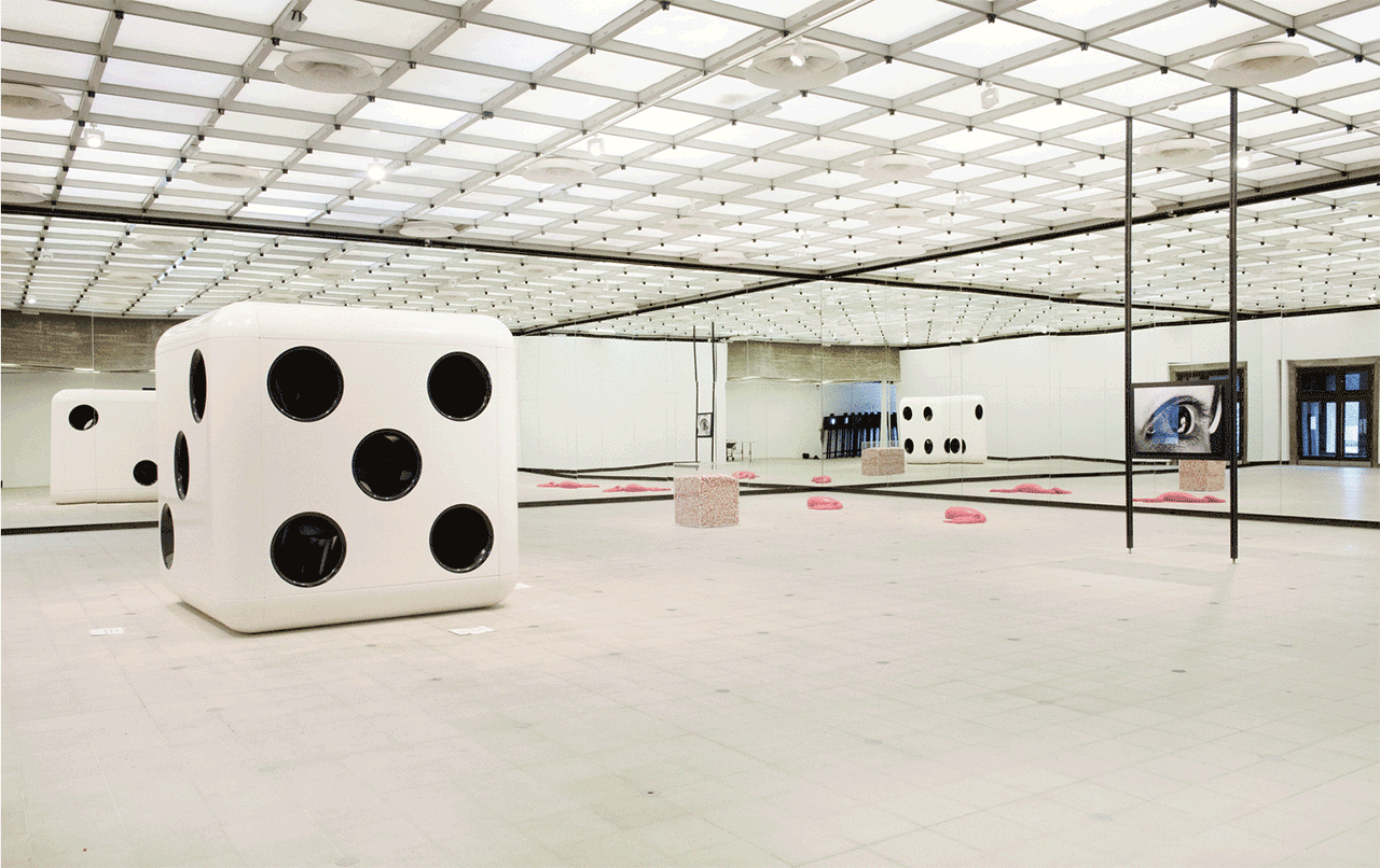 Carsten Höller, "Dice (White Body, Black Dots)" (2014;), "Half Mirror Room" (2008/2015), and "Snake" (2014), installation view in 'Carsten Höller: Decision,' Hayward Gallery, London, 2015  (art © Carsten Höller, image courtesy the artist, photo © Linda Nylind)