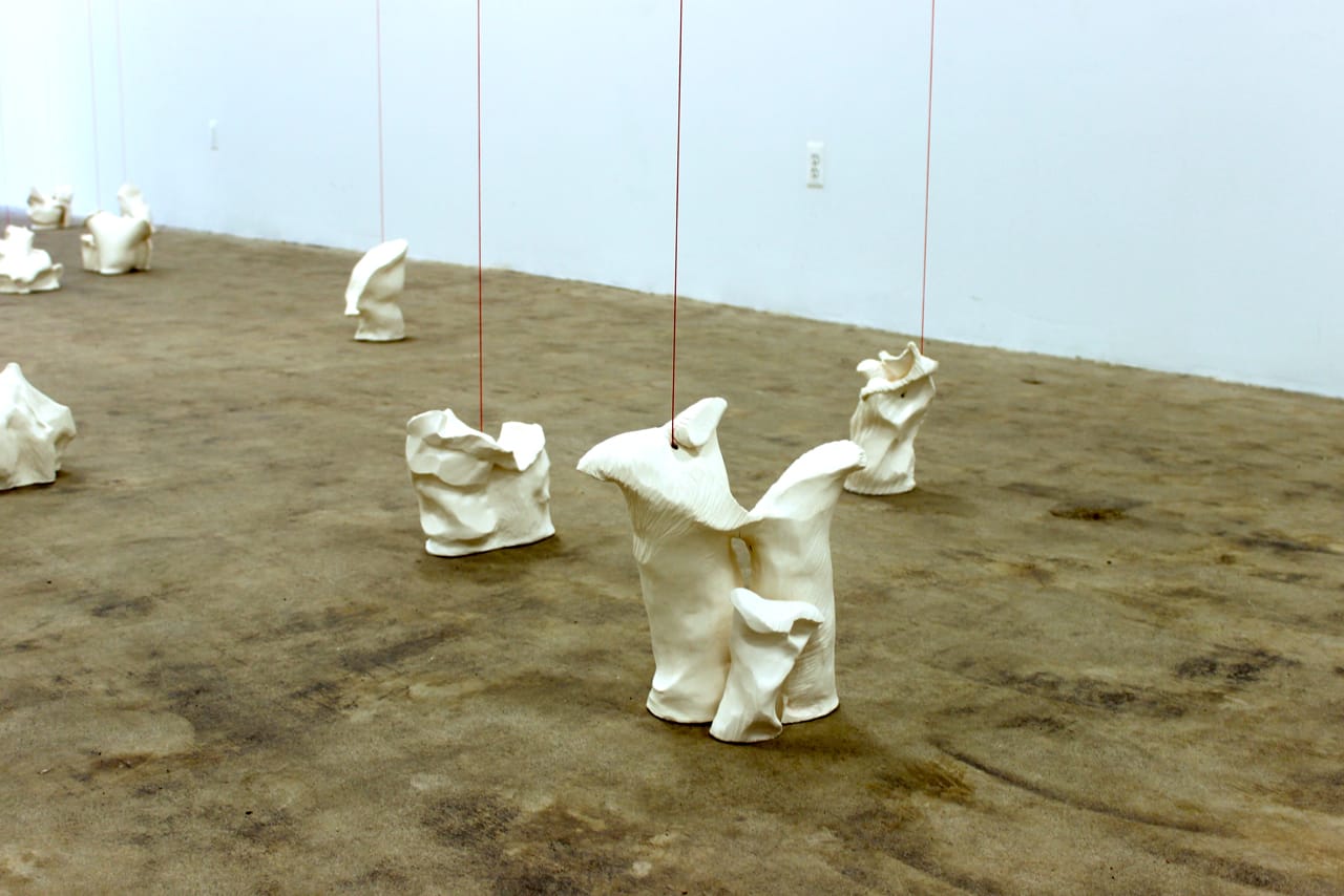 The porcelain bases of "Tensions (red)" emulate tree stumps.