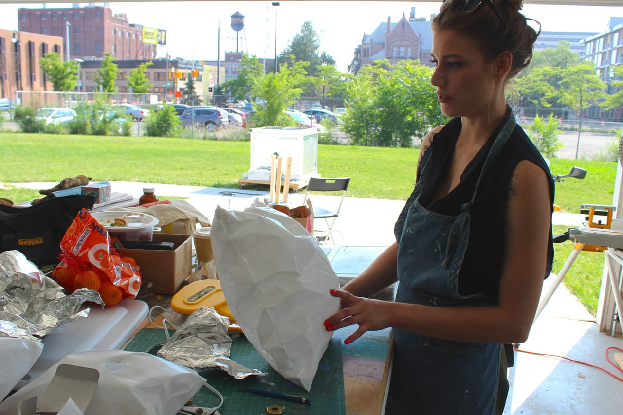 Rachel Mulder unwraps the roto-molded pillow/thing.