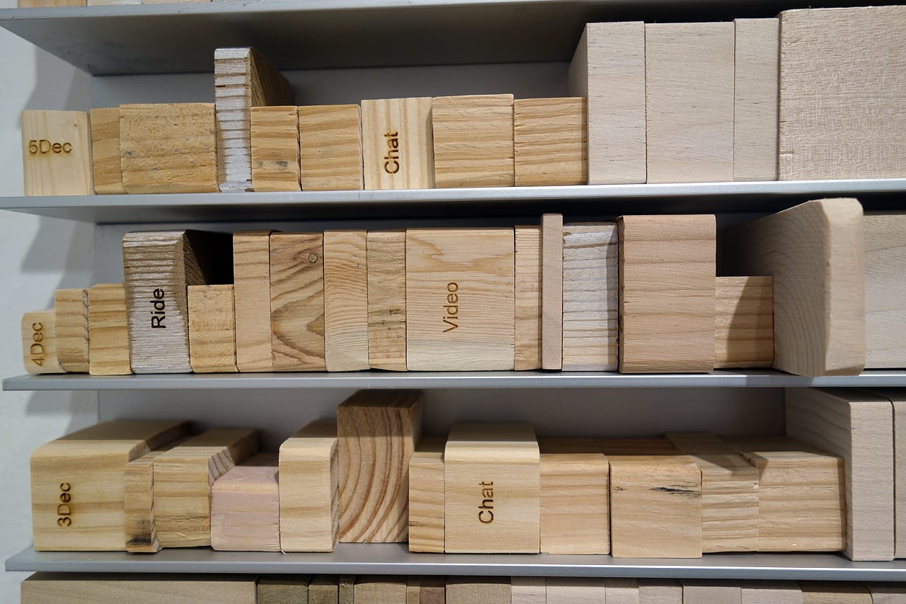 Laurie Frick, "Daily Time Slices Dec 15" (2015), laser etched wood blocks and aluminum, 40 x 48 x 2 inches, 21 days of 24 hour time-tracking