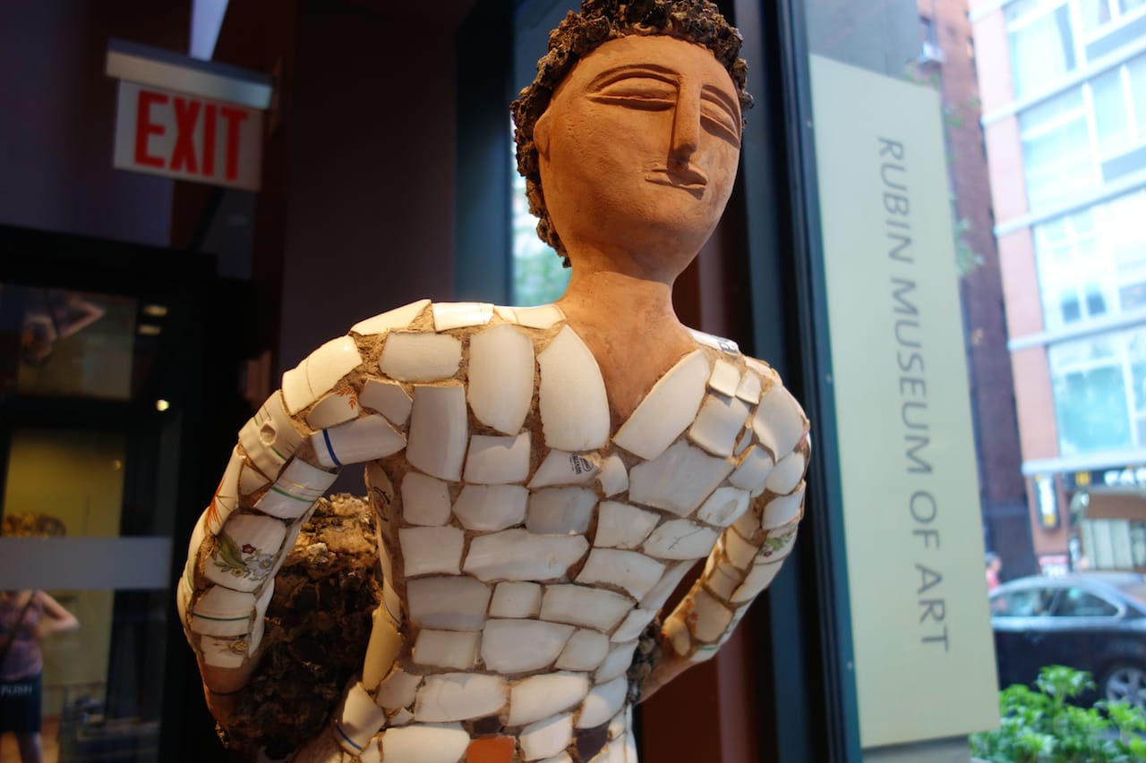 Nek Chand, "Boy with Back Basket, Ceramic Shirt, Clinker Legs" (1984-85), concrete, ceramic