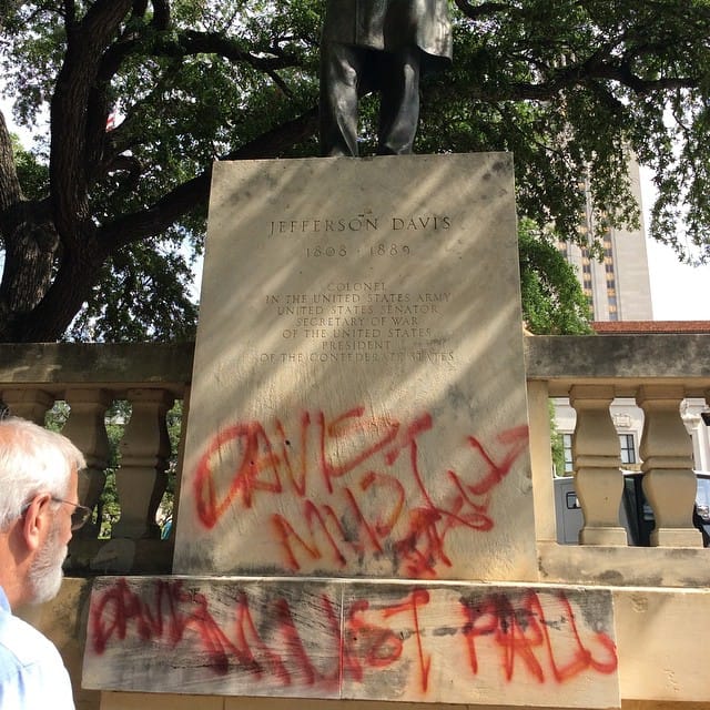 The vandalized statue of Jefferson Davis at the University of Texas at Austin (photo by @tinyjune/Instagram)