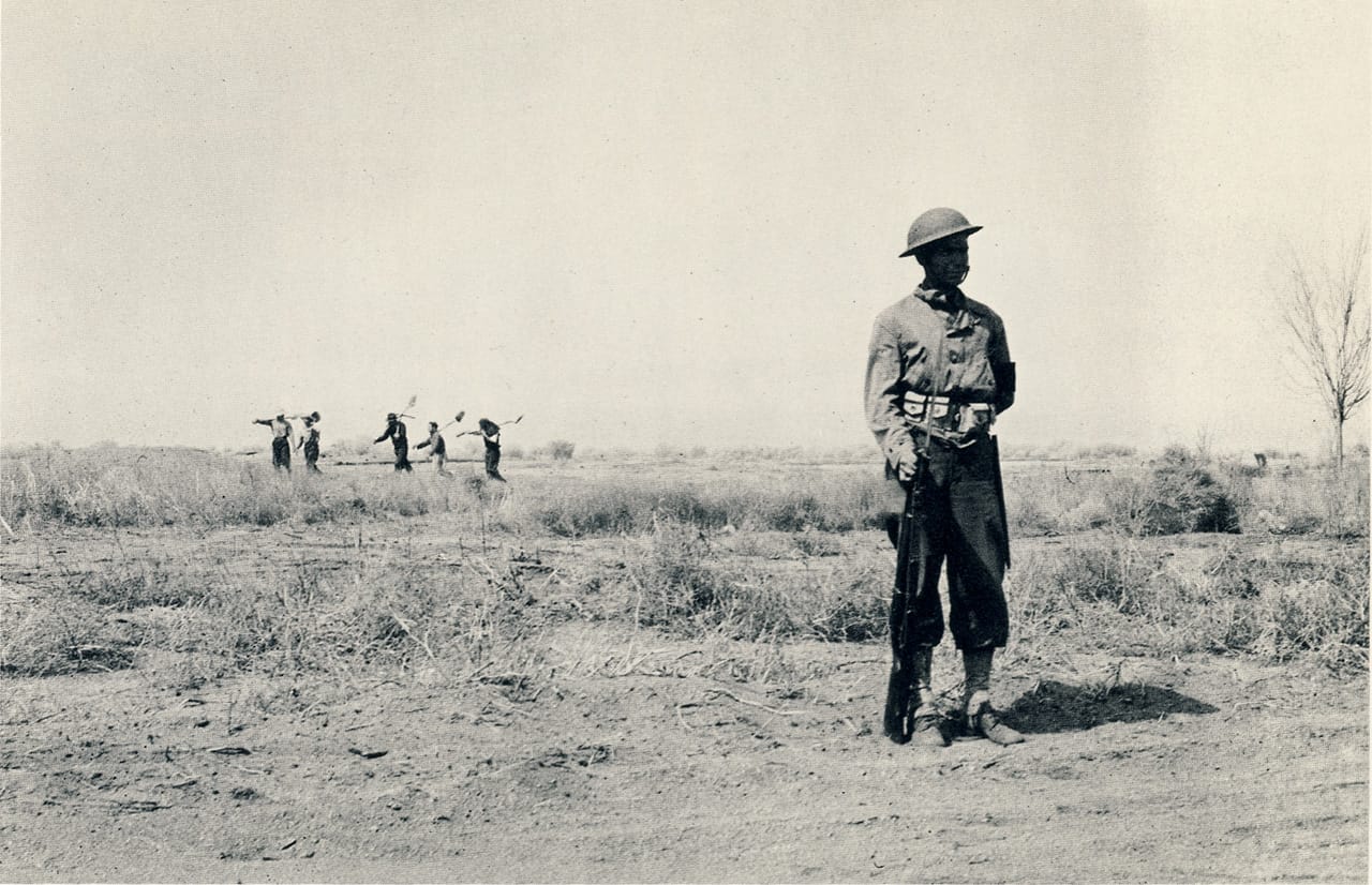 Clem Albers, "Manzanar, CA April 2, 1942" (1942).&nbsp;Incarcerees on their way to clear land of brush to build the country’s first concentration camp (photographed by Clem Albers, WRA, courtesy the National Archives)
