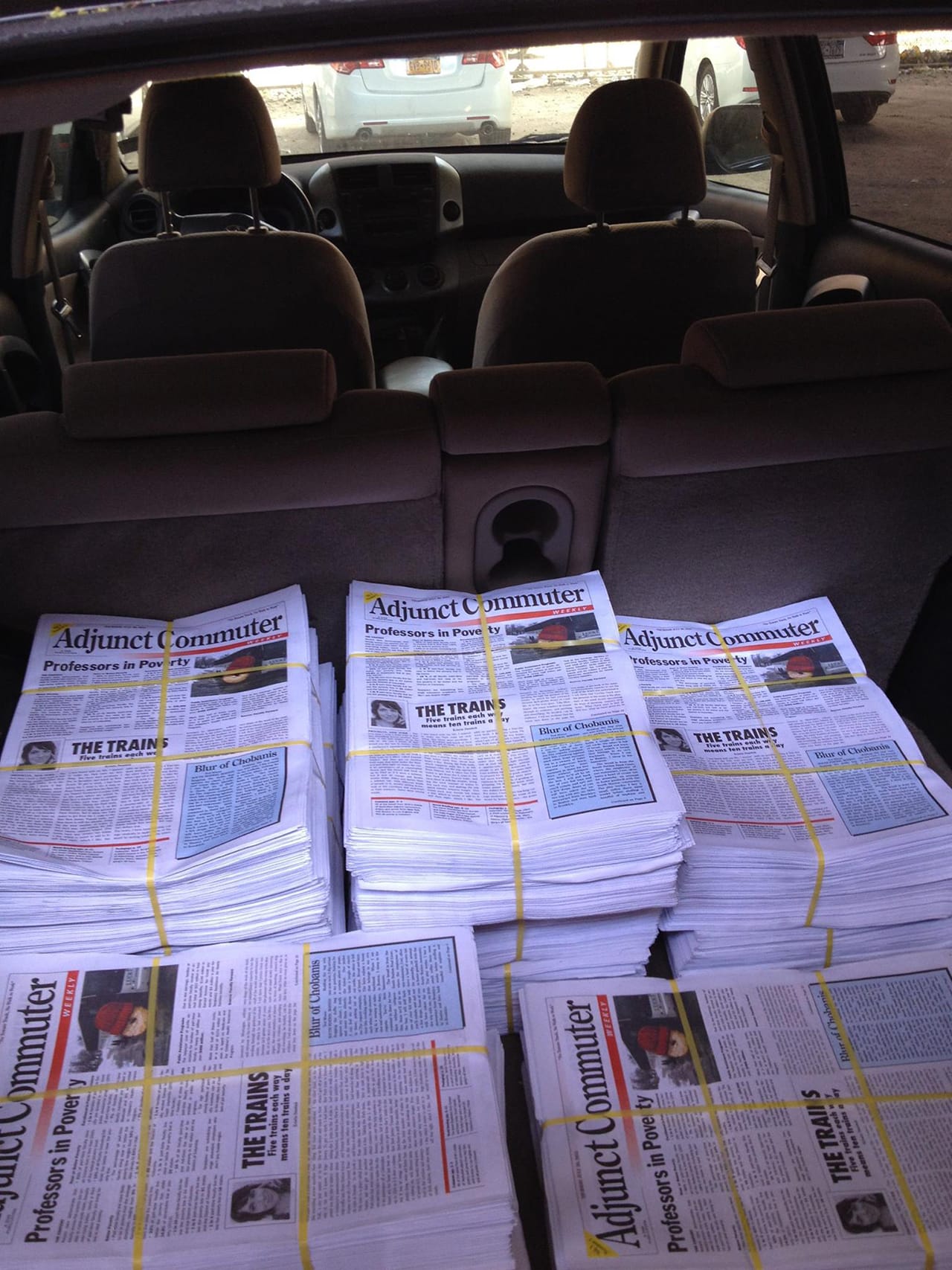 Copies of 'Adjunct Commuter Weekly' (image via Facebook) (click to enlarge)