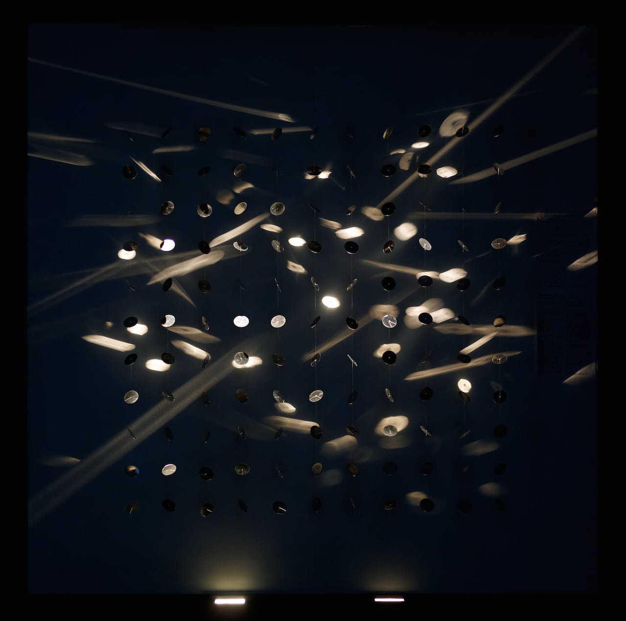Julio Le Parc, "Continuel-lumière mobile" ("Continuous light mobile or Unceasing Light Mobile") (1960–66), hanging metallic elements and spotlights (Museum of Fine Arts, Houston; museum purchase funded by the 2005 Latin American Experience Gala and Auction, and the Latin Maecenas; © 2015 Artists Rights Society, New York / ADAGP, Paris)