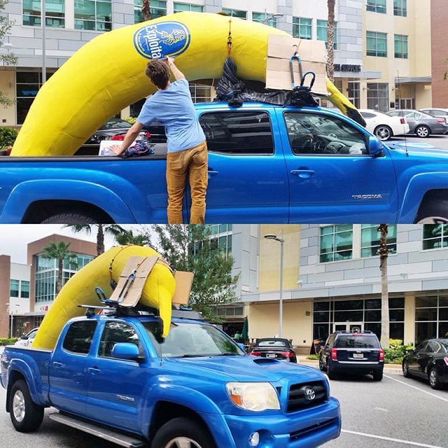 The artist SKIP strapping his banana sculpture to his truck shortly before it was stolen. (photo via @seeskip/Instagram)