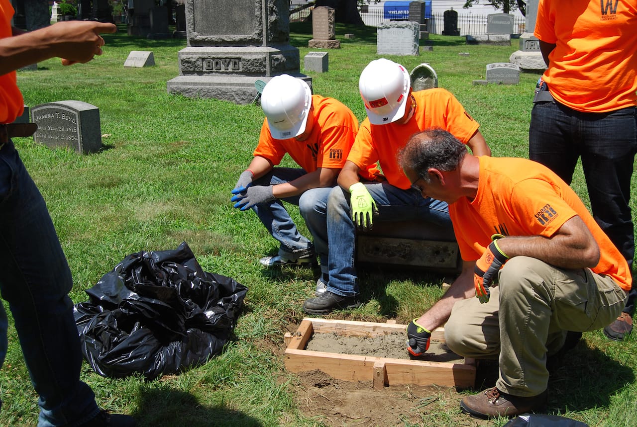 Interns at work in the Woodlawn Cemetery Preservation Training Program (photo by Susan Olsen, courtesy World Monuments Fund)