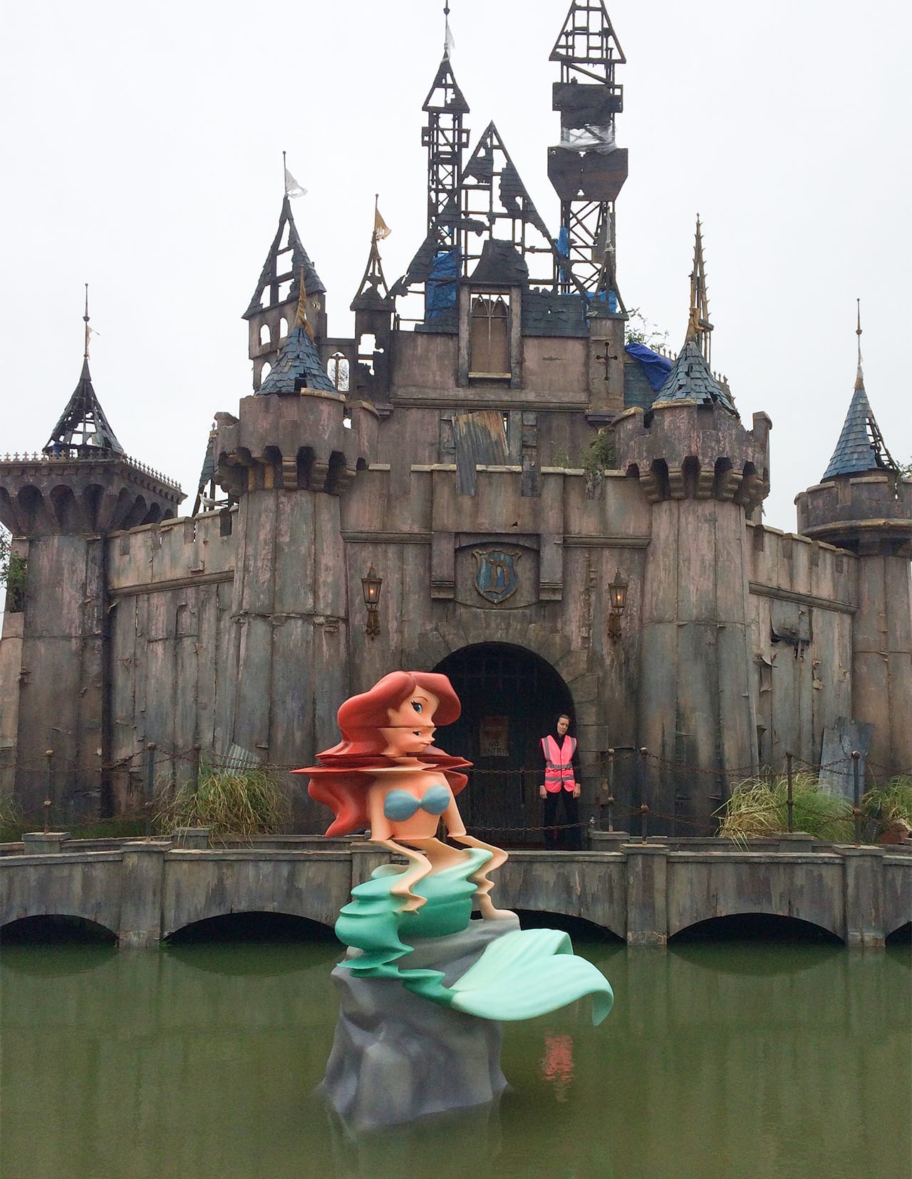 A glitchy Ariel is one of the Banksy works that will greet crowds to Dismaland (all images courtesy Christopher Jobson of Colossal, and used with permission)