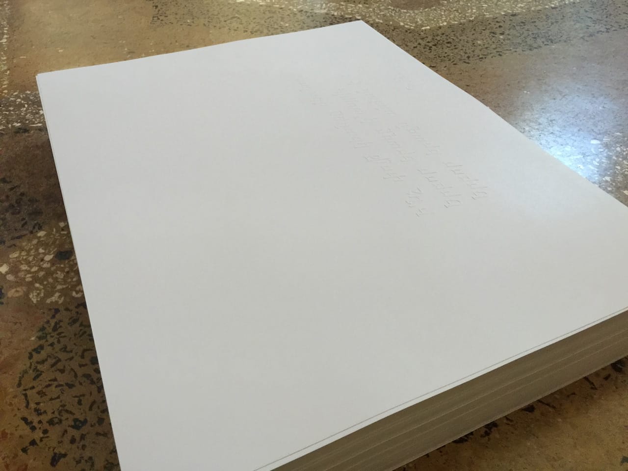 Mekhitar Garabedian's almost invisible embossed piece placed in the library for people to take. It features a poem by Taniel Varoujan.