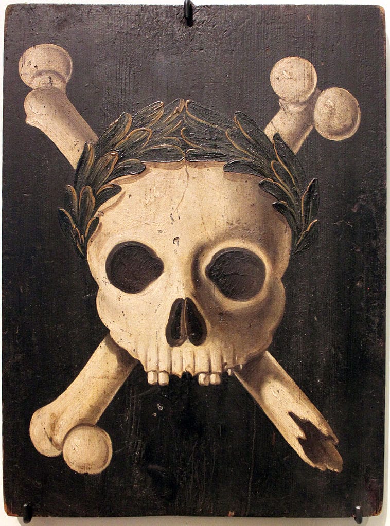 Plague panel showing death crowned with triumphant laurels. These types of panels were placed on German houses to warn against the plague in the 17th century (via Deutsches Historisches Museum Berlin)