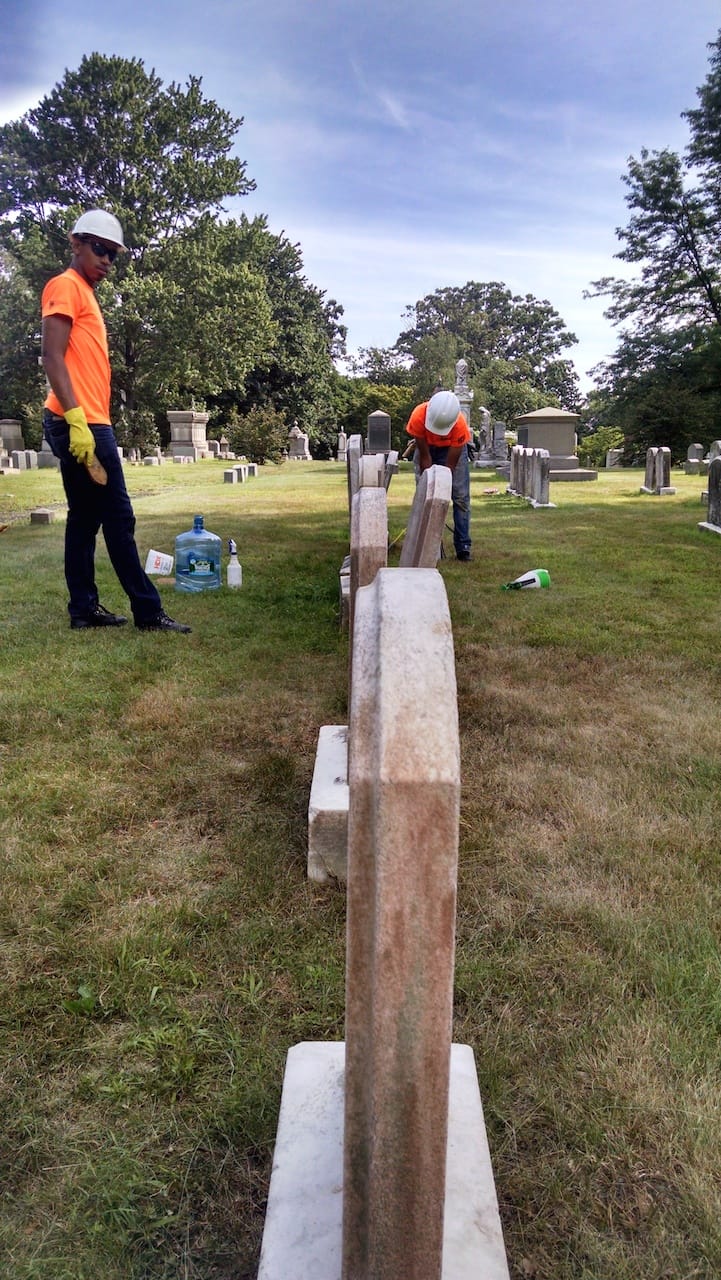 The interns work at the Gracie plot in Woodlawn Cemetery (photo by Rob Cappiello)