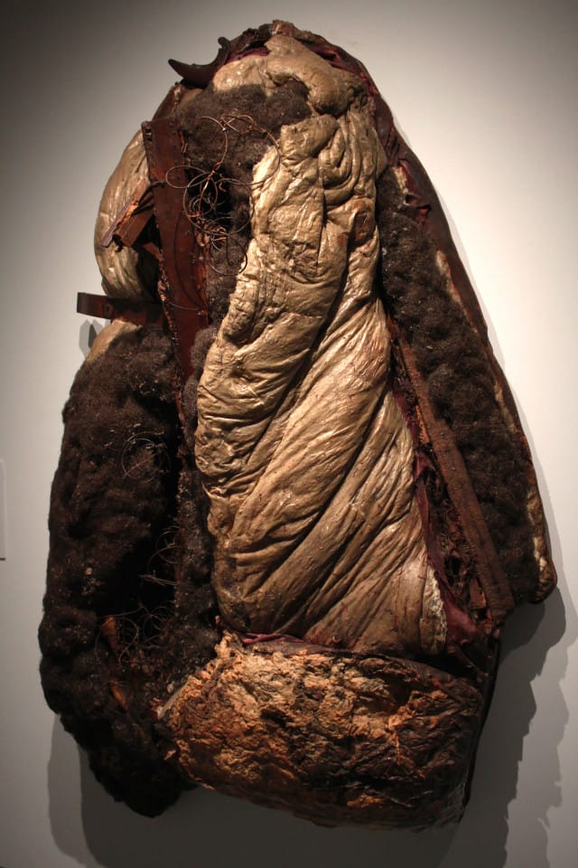 Raphael Montañez Ortiz, “Archeological Find #21: The Aftermath” (1961) destroyed sofa, wood, cotton, vegetable fiber, wire, and glue on wooden backing 84 x 54 x 24 Inches