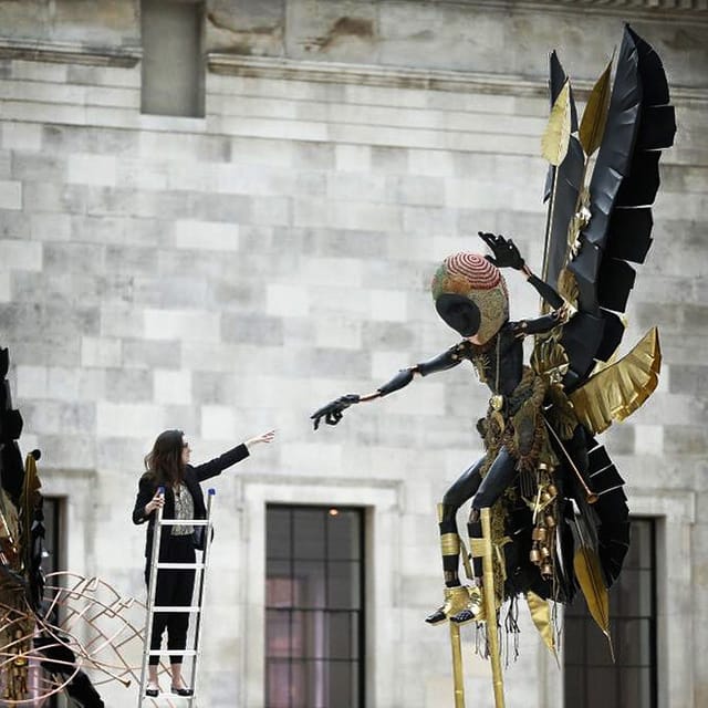 The British Museum's Katie Morais poses with a Moko Jumbie sculpture by Zak Ové (all images courtesy Zak Ové unless otherwise noted) (click to enlarge)