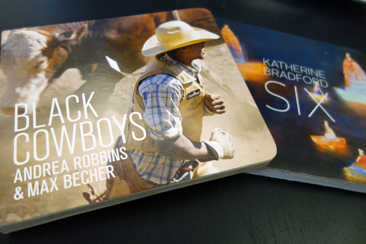 'Black Cowboys' by Andrea Robbins & Max Becher and 'Six' by Katherine Bradford (photo of the books for Hyperallergic)