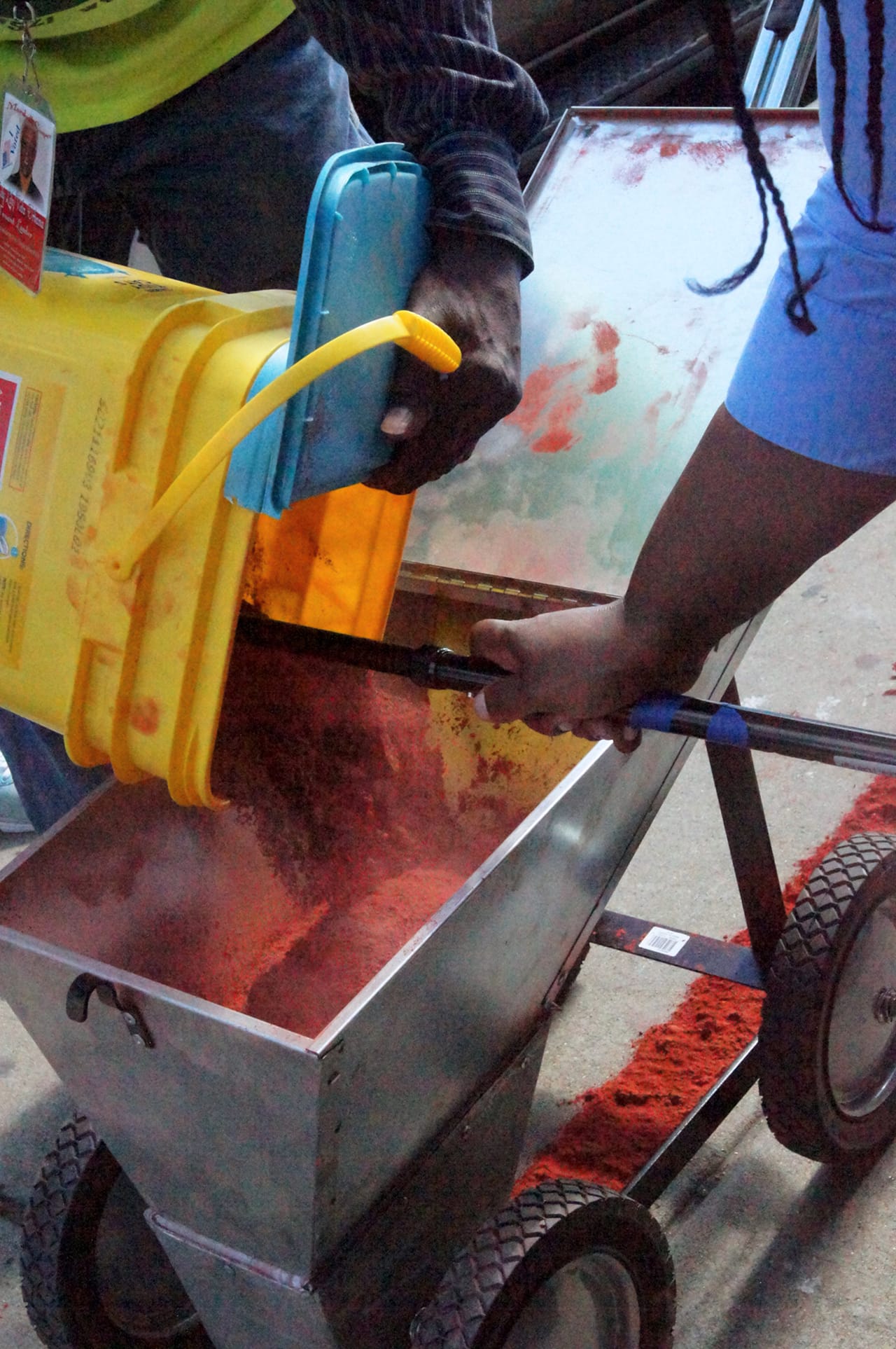 Mr. Marshall and Carolyn Lomax load the line marker.