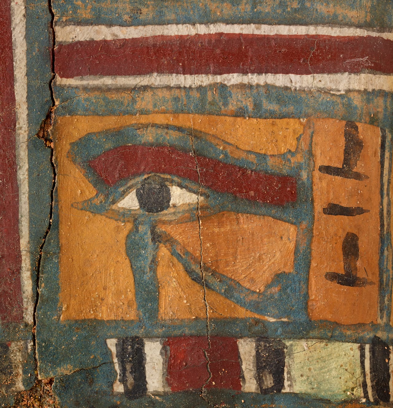 Eye of Horus, the falcon god, on a detail of an ancient Egyptian coffin (© 2015 The Field Museum, photo by John Weinstein)