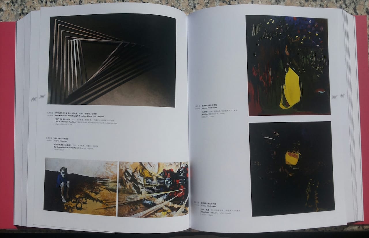 The pages in the middle of the Armenian Special Exhibit section in the BIAB catalog now jump from 300 to 305, following the removal of Karen Mirzoyan’s five photographs (photo by Anna Gargarian)