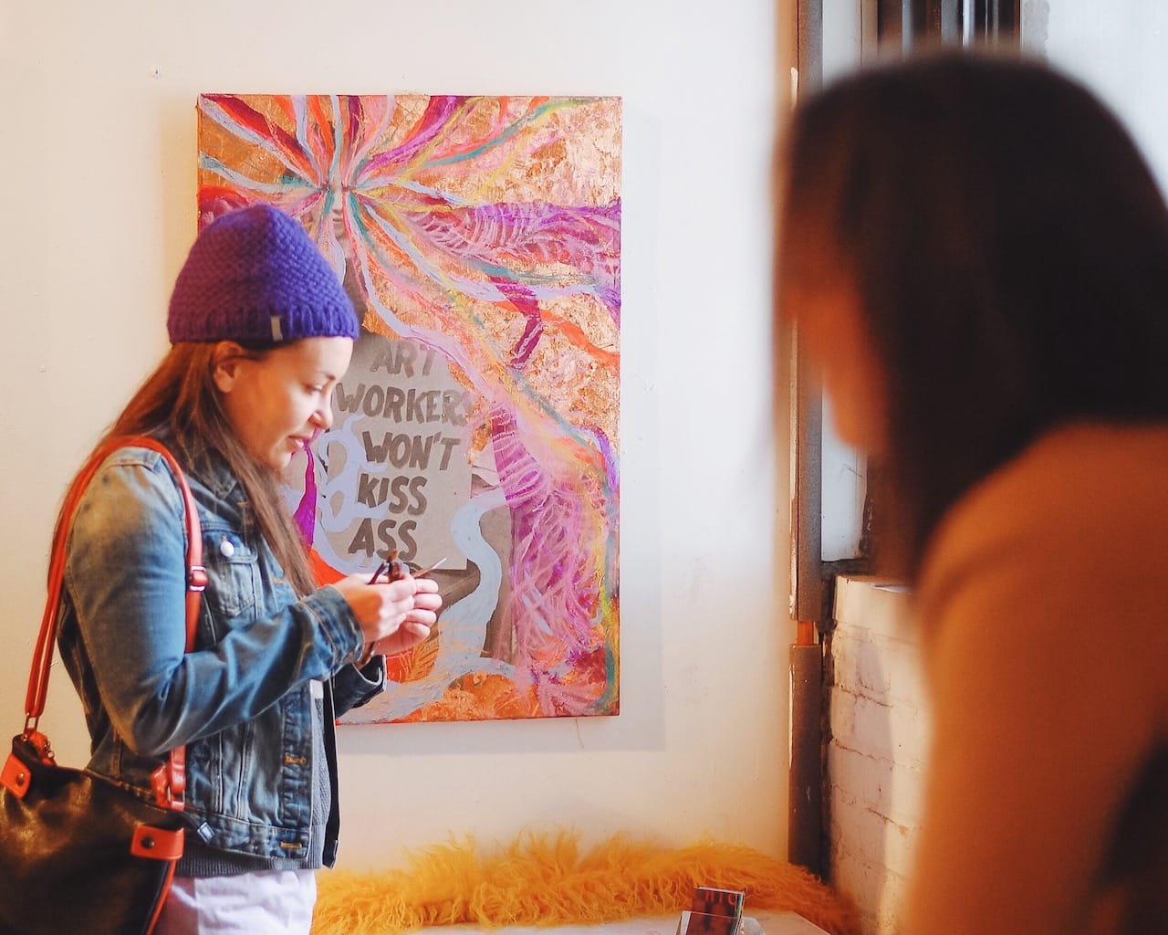 Visitors in Alex Nuñez's studio during Gowanus Open Studios 2015