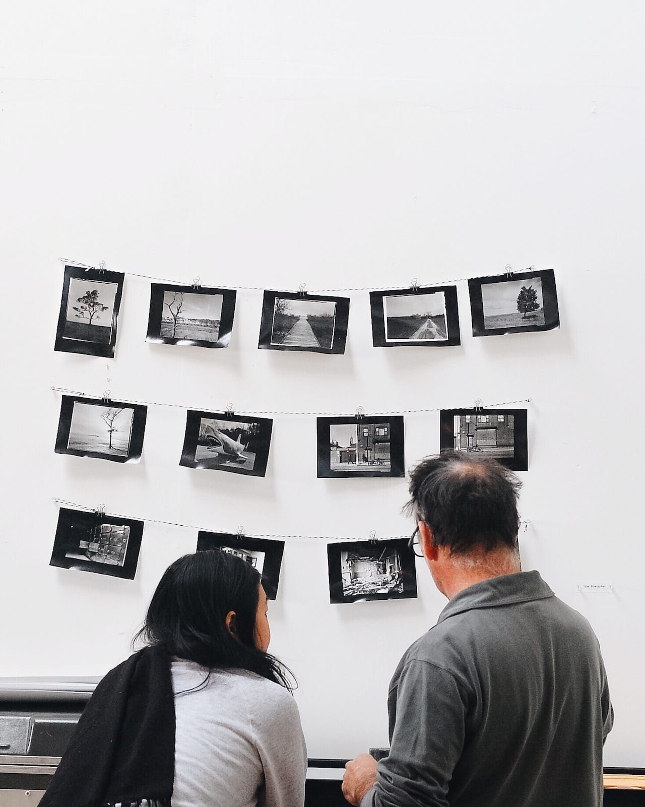 Visitors looking at work in the Gowanus Print Lab during Gowanus Open Studios