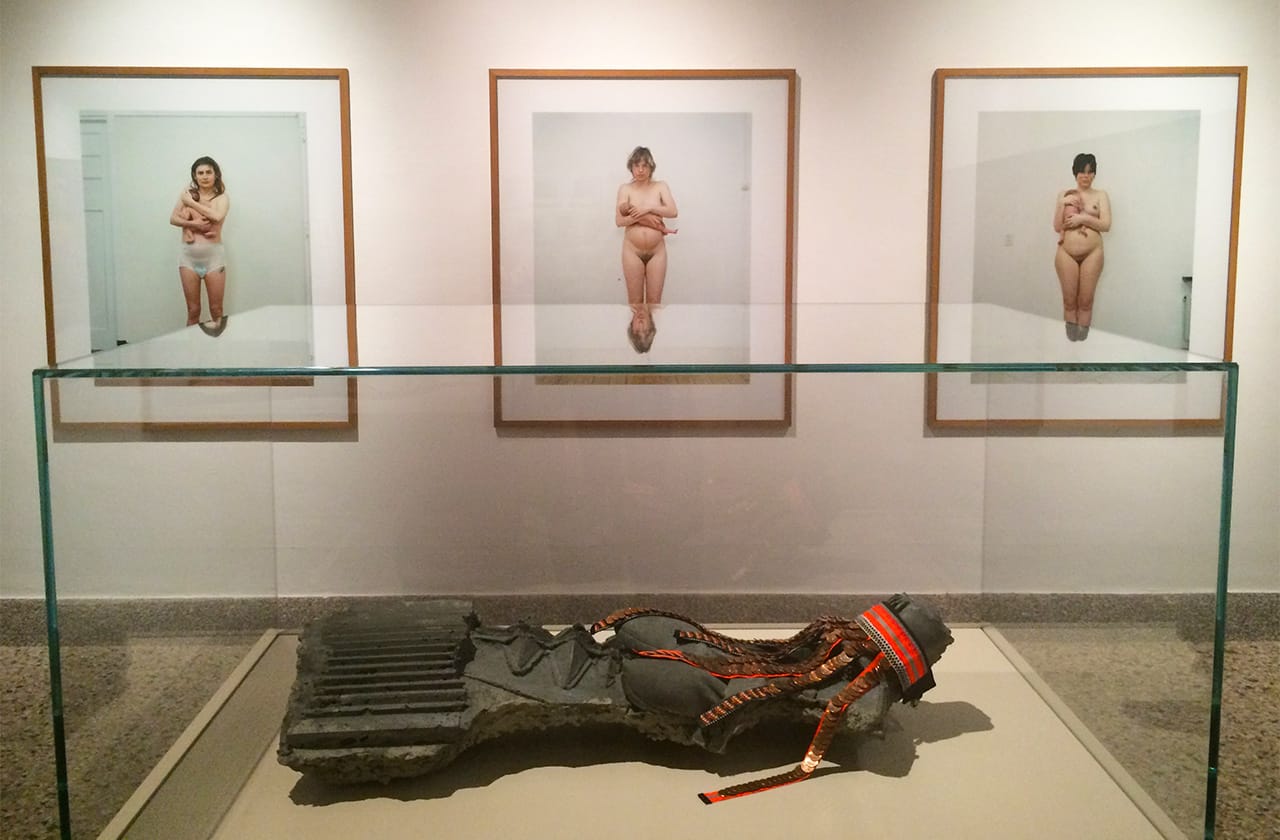 Photos from Rineke Dijkstra's 'New Mothers' series (1994) and a sculpture by Andra Ursuta