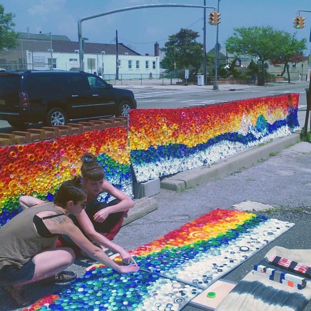 Lisa Be's "CAPS for KIDS" mural being installed in Long Beach two years ago. (photo by @tallboysclub/Instagram)