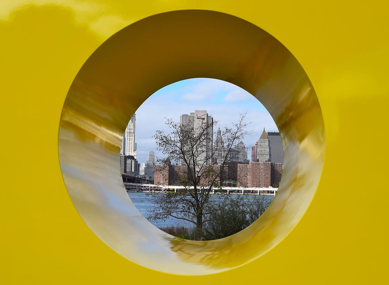 Detail of Deborah Kass's "OY/YO" (2015) with the view of Manhattan through the letter O