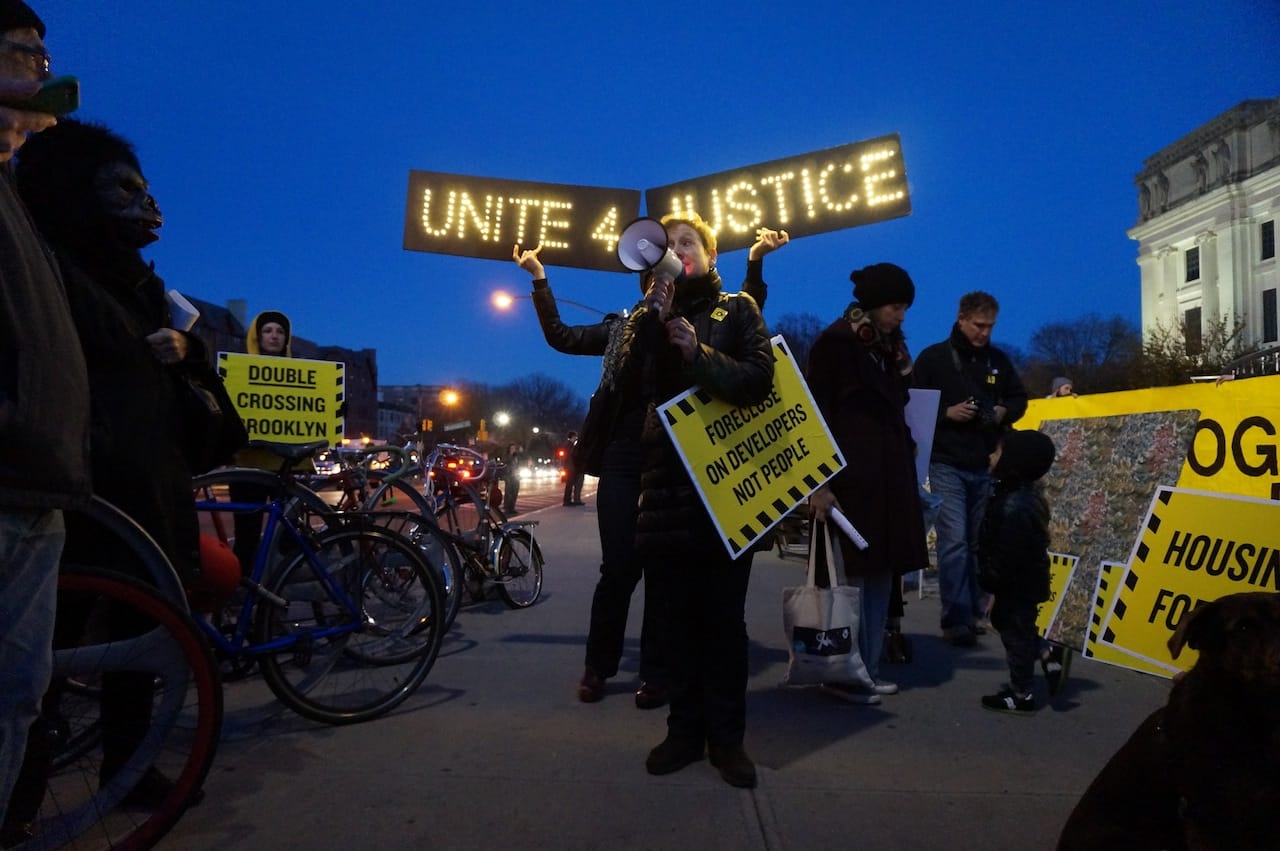 Jenny Dubnau speaking to the crowd (click to enlarge)