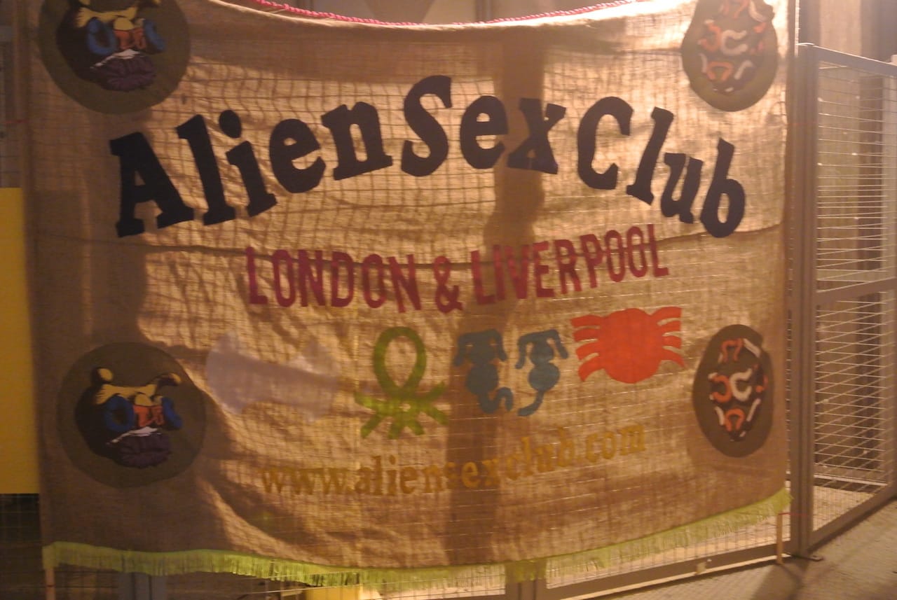 Banner for John Walters' 'Alien Sex Club'