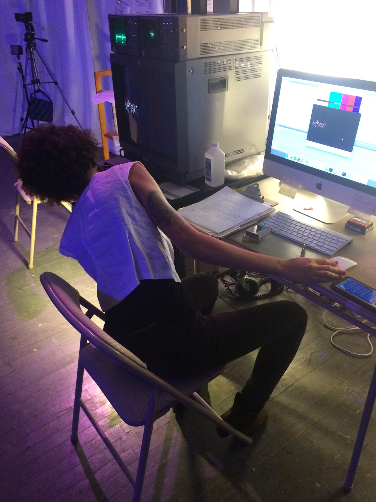 A XFR Collective member digitizing a mini DV tape