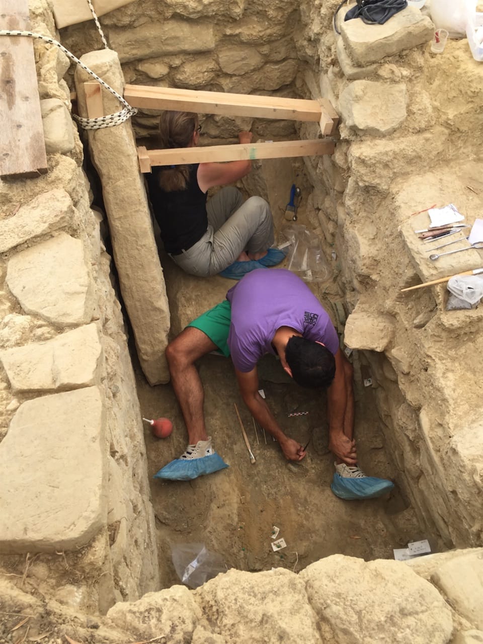 University of Cincinnati faculty and staff in the Griffin Warrior tomb (click to enlarge)